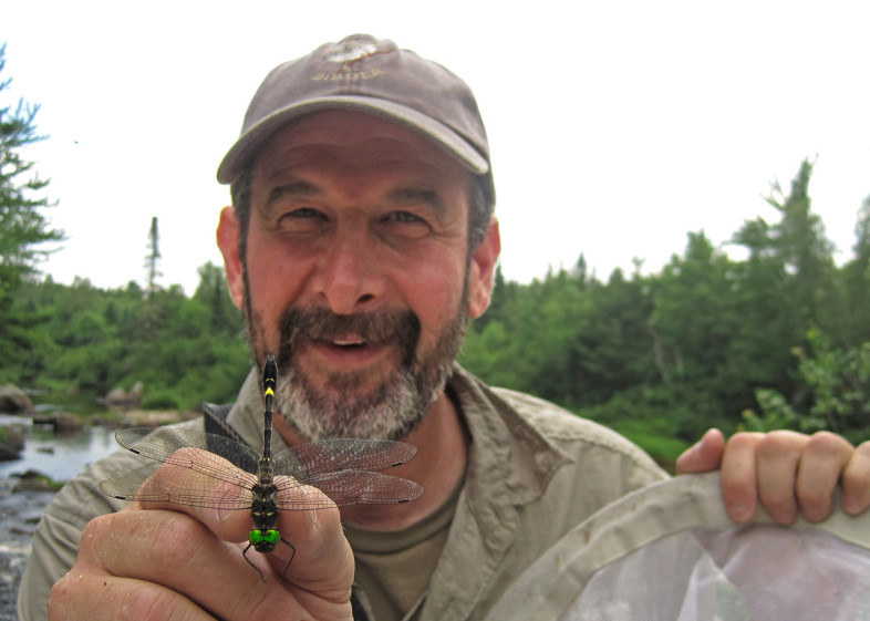 Bryan Pfeiffer hold an 'ode' in his hand. 