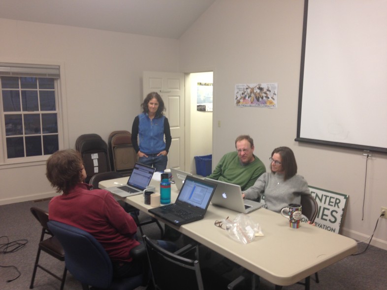 VCE scientists gather in the back room for a hackathon to make as much of our data publicly discoverable and available as possible.