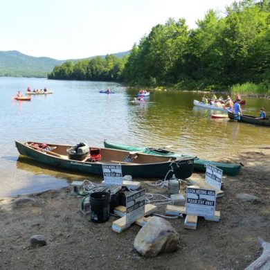 Preparing to add/swap out new sign buoys on Chittenden Reservoir on a warm, sunny day! Photo by Eric Hanson.