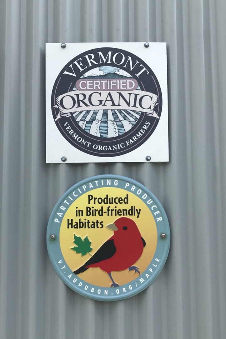 A sign recognizing a producer for their participation in the Bird-friendly Maple Project. &copy; Sam Blair